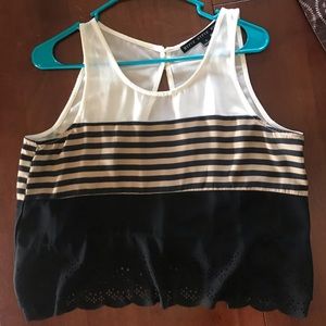 White tan and black tank